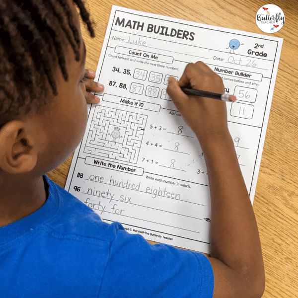 2nd grade spiral math review male student 1